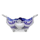 A monumental Edwardian pierced silver two-handled bowl / centrepiece Carrington & Co, London 1909