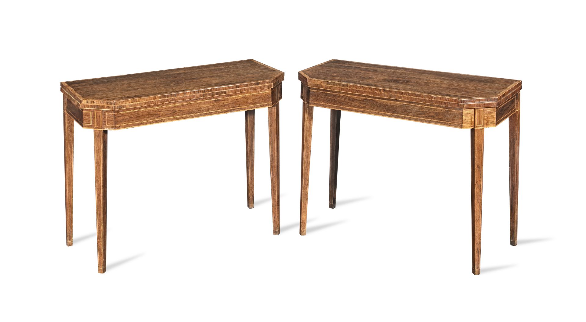 A pair of late George III rosewood and crossbanded card tables Circa 1800 (2)