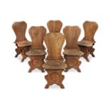 A set of six 19th century mahogany hall chairs in the George II 'sgabello' style (6)