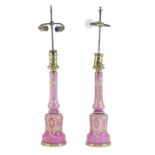 A pair of late 19th century Bohemian pink and opaque glass lampbases (4)