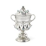 A Victorian Gothic Revival silver and turquoise pedestal cup and cover John Hardman & Co, Birmin...