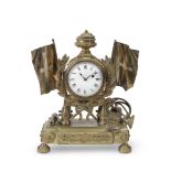 An early 20th century French gilt brass 'pendule d'officier' travel clock together with a brass ...