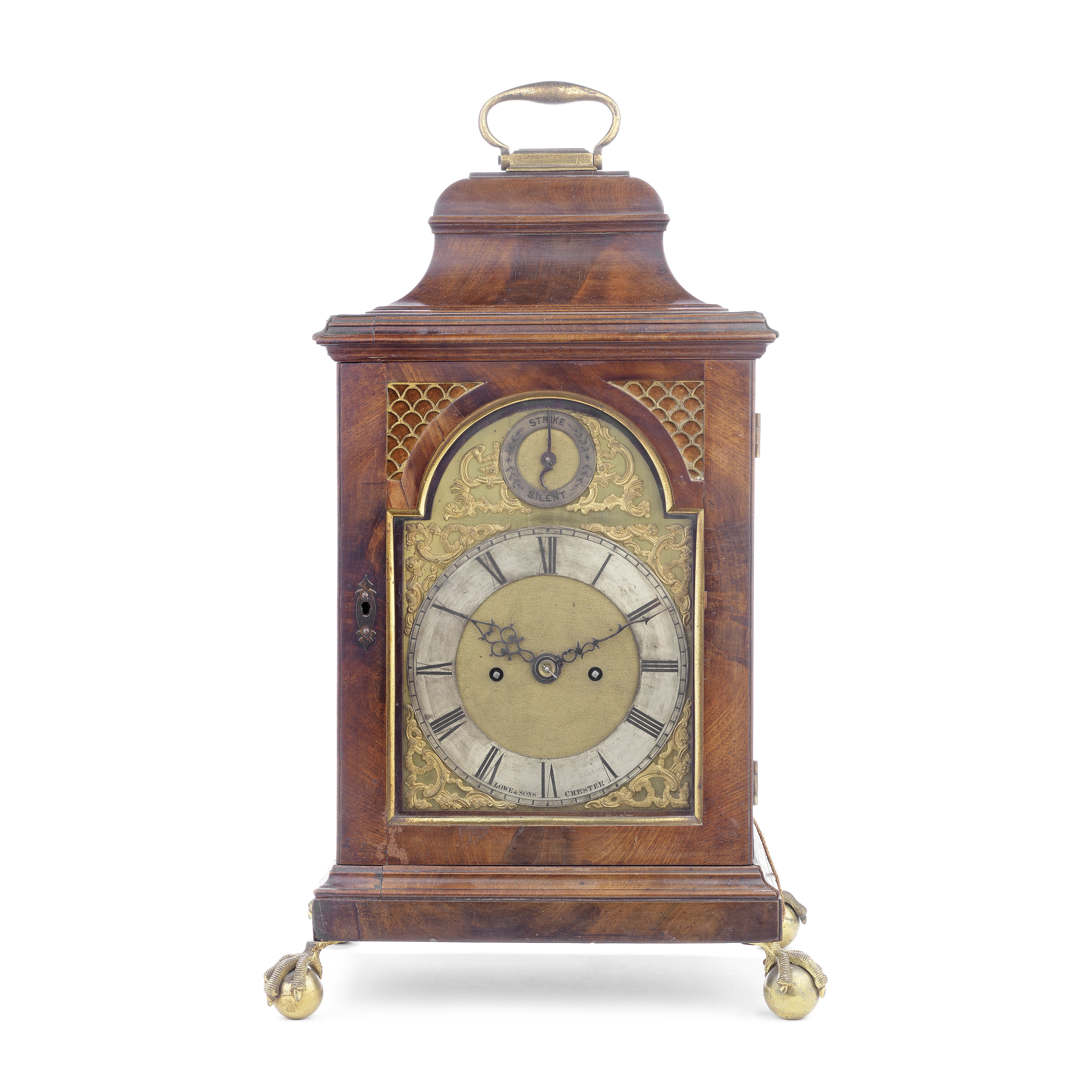 A late 19th century mahogany bell topped table clock the dial signed Lowe & Sons, Chester