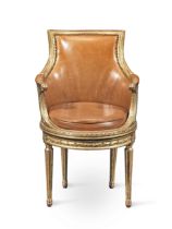 A French 19th century giltwood fauteuil de bureau in the Louis XVI style