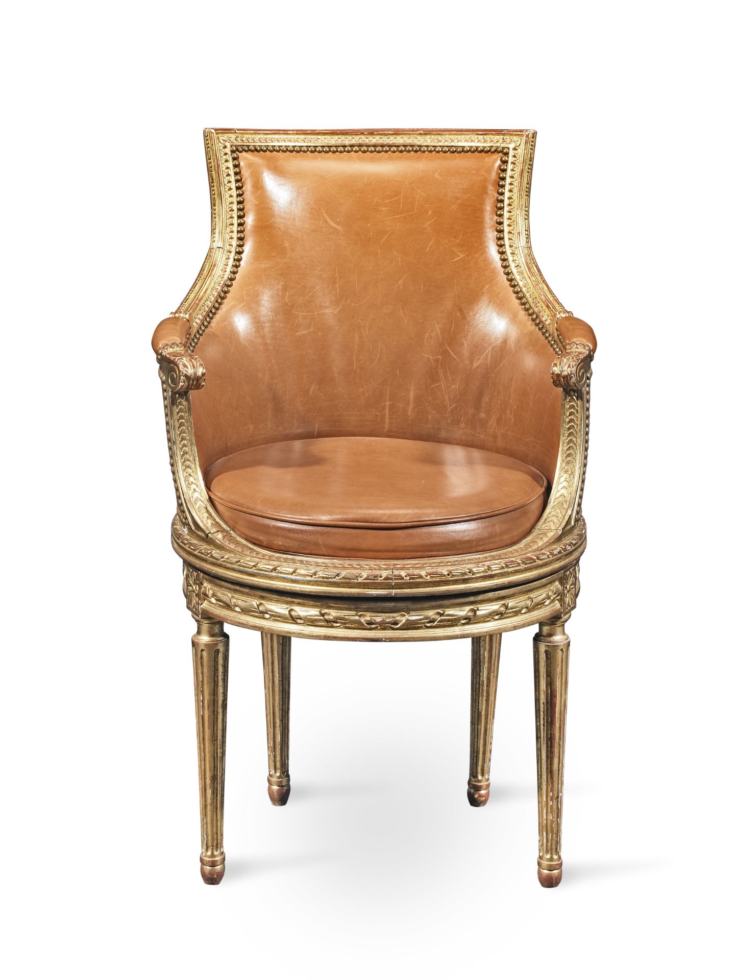 A French 19th century giltwood fauteuil de bureau in the Louis XVI style