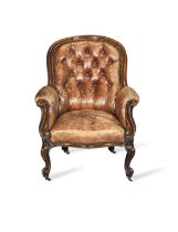 A Victorian walnut low armchair or bergere
