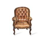 A Victorian walnut low armchair or bergere