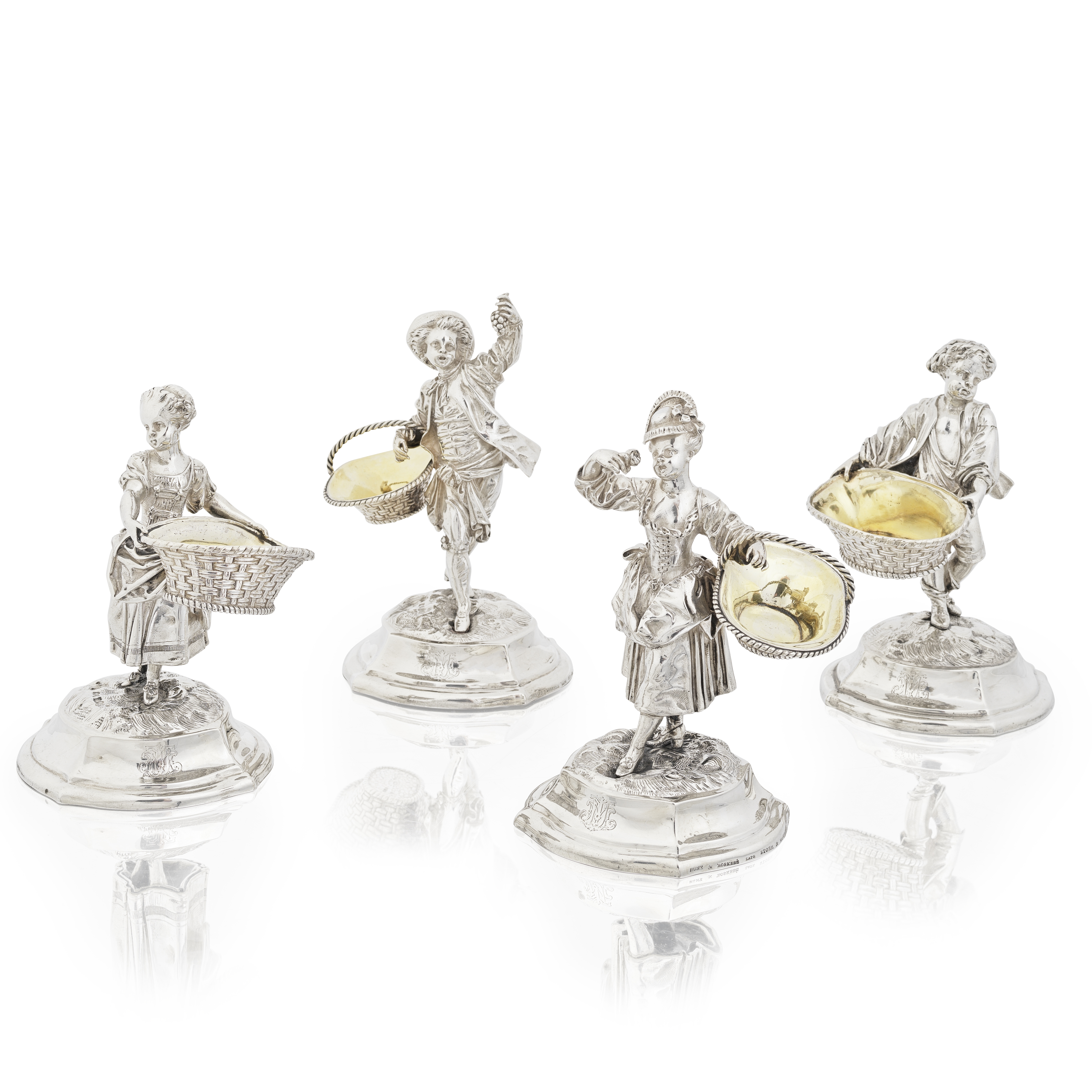 A set of four Victorian silver and parcel-gilt figural salts John Samuel Hunt, London 1854, incu...
