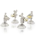 A set of four Victorian silver and parcel-gilt figural salts John Samuel Hunt, London 1854, incu...