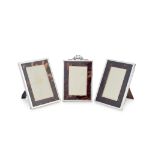 Three silver and tortoiseshell photograph frames E Mander & Son, Birmingham 1902, Goldsmiths & S...