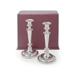 A pair of George III silver candlesticks, later cased John & Thomas Settle, Sheffield 1819, one ...