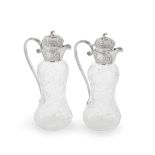 A pair of Art Nouveau silver-mounted cut-glass claret jugs Harrison Brothers & Howson, Sheffiel...