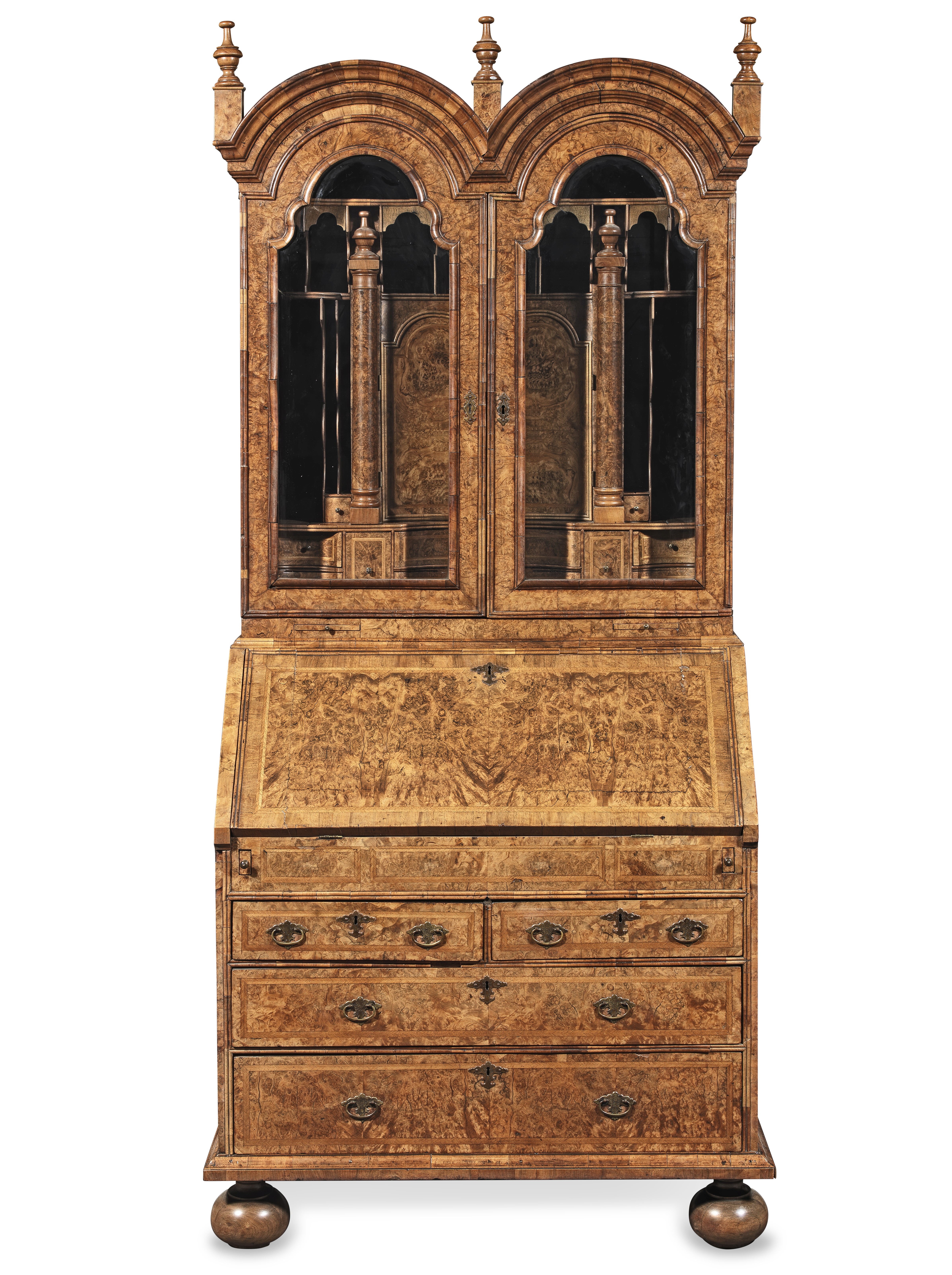 An impressive Queen Anne or George I burr walnut, figured walnut and featherbanded bureau cabine...