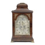 A George III brass mounted mahogany table bracket clock the dial signed for John Harrison, London