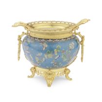 A late 19th century French gilt bronze mounted and champleve enamel jardini&#232;re in the mann...