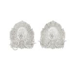 A pair of electroplated cast metal twin-light wall appliques unmarked, in the 17th century style...