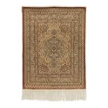 A signed silk Hereke carpet West Anatolia, 129cm x 98cm