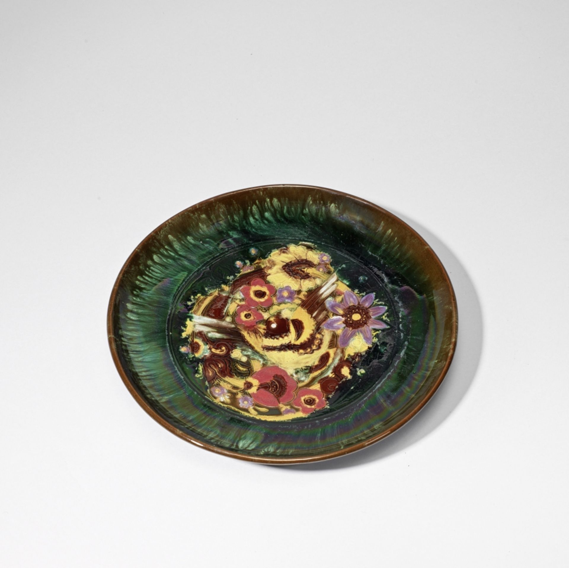 Dr Christopher Dresser: Made by Linthorpe Pottery Plate with moulded bird design, circa 1880