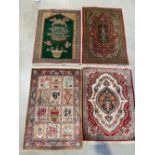 Quatre tapis iraniens