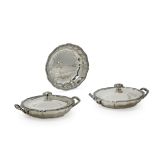 Pair of silver two-handled tureens and a silver dish