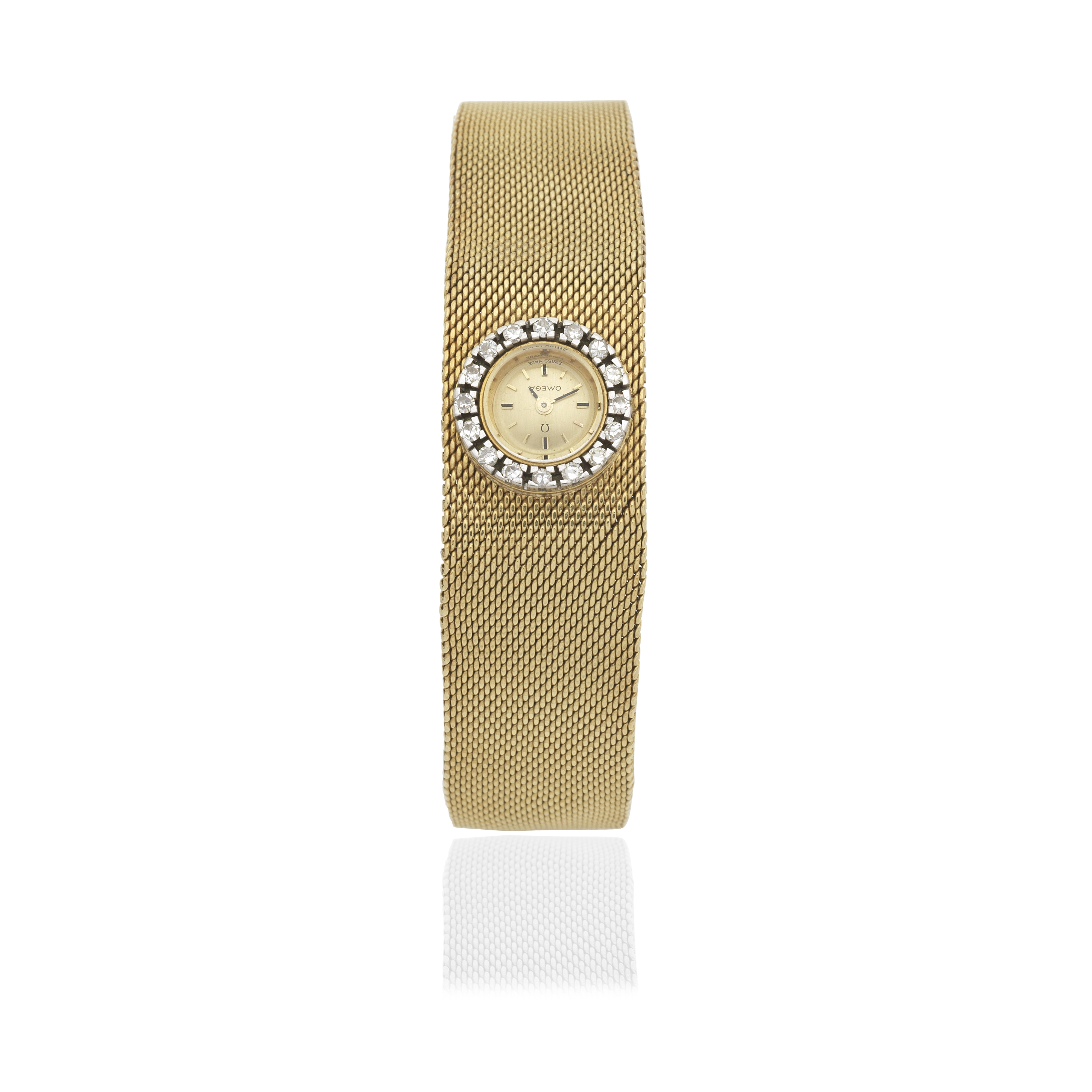 Omega. A lady's 18K gold diamond set manual wind bracelet watch Circa 1960