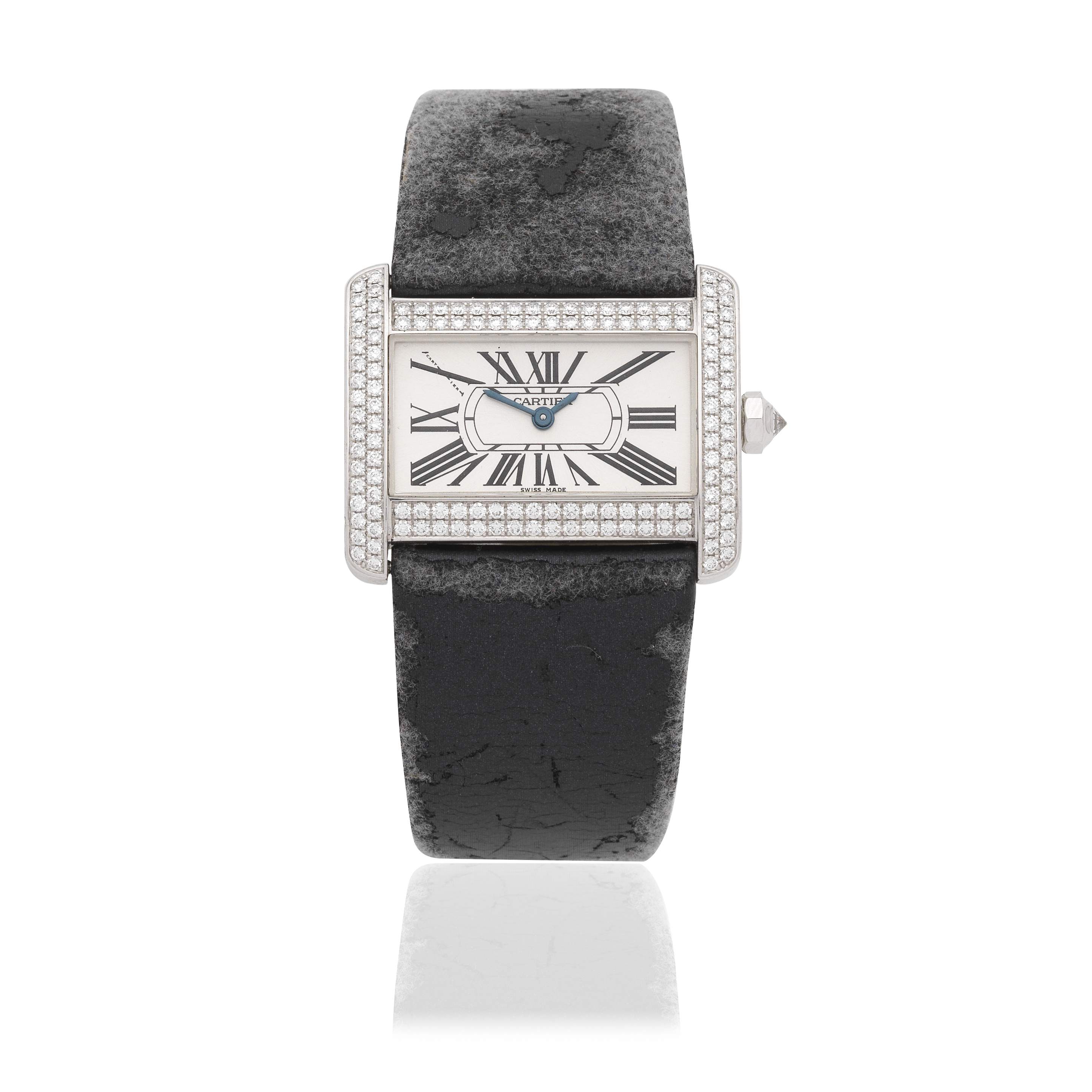 Cartier. A lady's 18K white gold diamond set quartz wristwatch Divan, Ref: 2613, Circa 2010