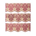 A set of three red damask appliqu&#233; pelmets Late 17th century, probably Spanish