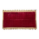 A coverlet of red silk velvet 17th century, Italian or French