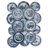 A collection of Chinese blue and white plates and dishes 18th - 19th century