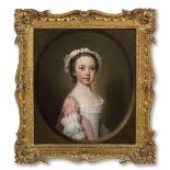 George Knapton (London 1698-1778) Portrait of a girl, half-length, in a pink and white dress, wi...