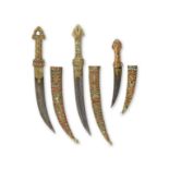 Trois dagues Ottomanes en acier damasquin&#233; or serties de corail et turquoise (jambiyyas), T...
