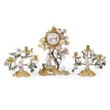 Garniture Louis XV comprenant une pendule en bronze dor&#233;, figure en porcelaine Meissen et f...