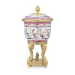 A gilt bronze mounted Serves style porcelain ecule and cover in the Louis XVI style, the mounts ...