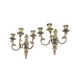 A pair of unusual early 19th century French gilt bronze three-light wall appliques (2)