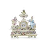 A large 19th century German porcelain figural mantel clock in the Meissen style