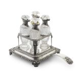 A George IV silver four bottle condiment set Philip Rundell London 1822, one bottle mount Paul ...