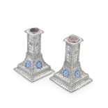 A rare Arts and Crafts style pair of silver and enamel dwarf candlesticks not assayed, John Ferg...
