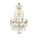 An impressive sixteen-light gilt brass and cut and moulded glass cage chandelier in the Louis XV...