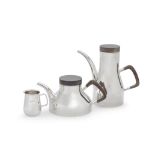 ROBERT RADFORD WELCH: a silver coffee pot, tea pot and cream jug, designed for Heals Birmingham ...