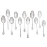 Four 17th century silver trefid spoons and a large collection of antique silver spoons varying m...