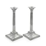 A pair of George III silver Corinthian column candlesticks John Winter & Co, Sheffield 1775