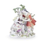 A late 19th century Meissen porcelain figural group of a pair of courtly lovers