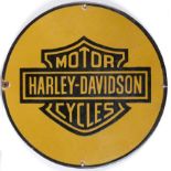 A circular Harley-Davidson Motor Cycles enamel sign