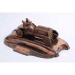 A copper plated pewter motoring desk piece, circa 1905,