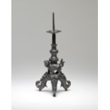 A BRONZE 'MYTHICAL BEAST' PRICKET CANDLESTICK 16th century