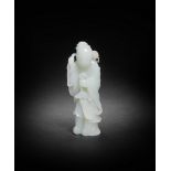 A FINE WHITE JADE CARVING OF A SAGE Qianlong