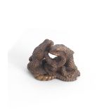 MASANAO OF ISE (ACTIVE 19TH CENTURY) A Wood Okimono (Table Ornament) of Three Toads Edo period (...