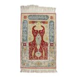 A fine silk prayer rug Iran, 20th Century