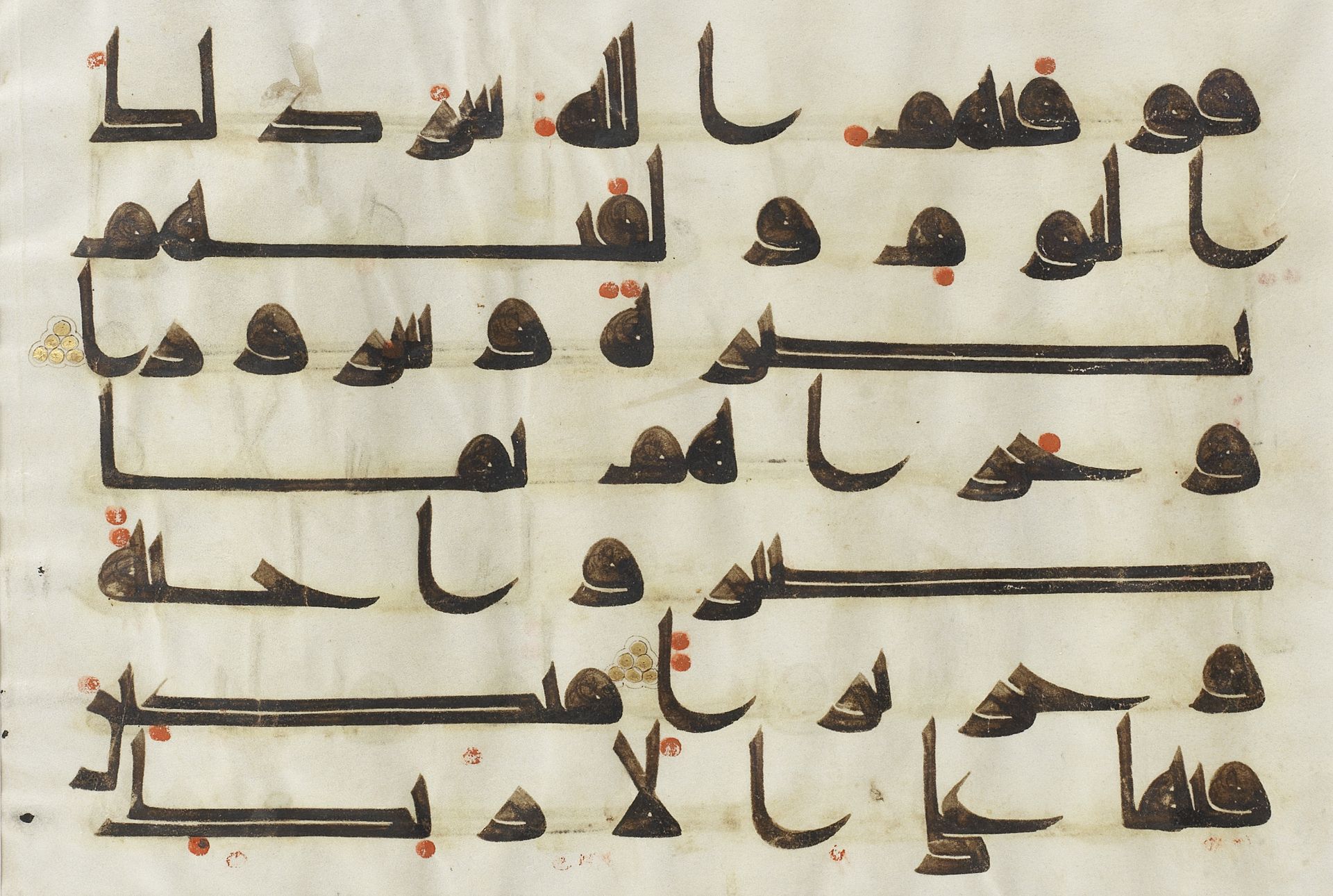A Qur'an leaf written in kufic script on vellum Near East or North Africa, 9th-10th Century