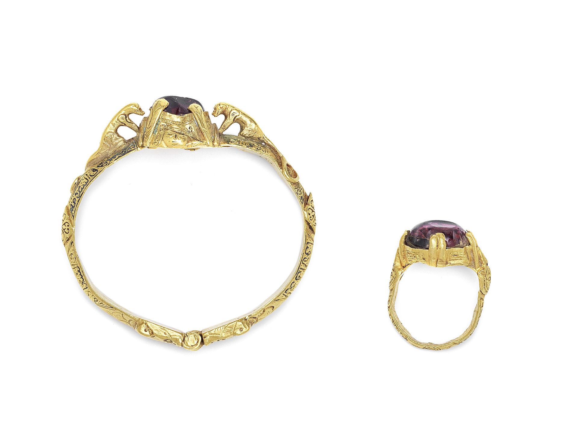 A fine Seljuk niello gold gem-set bangle and gem-set gold ring Persia, 12th Century(2)